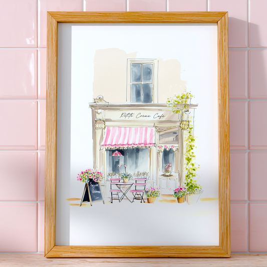 Framed artwork of a cafe on a pink tiled wall