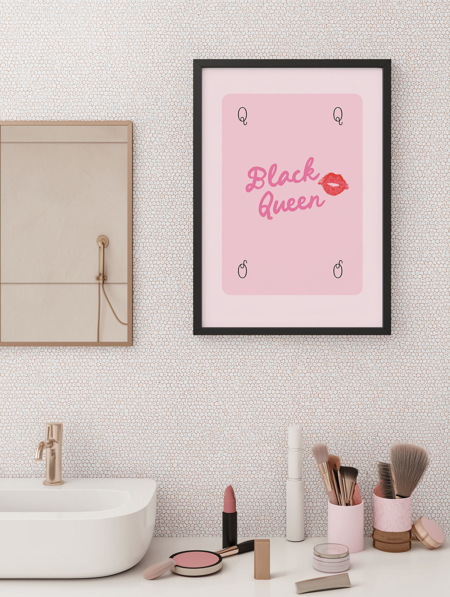 Pink Black Queen wall art print in black frame above bathroom sink with makeup decor