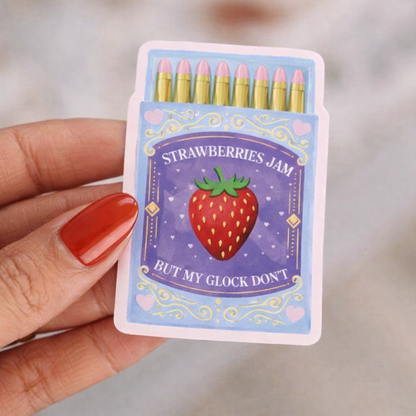 Hand holding a small card with 'Strawberries & Jam' design and text.